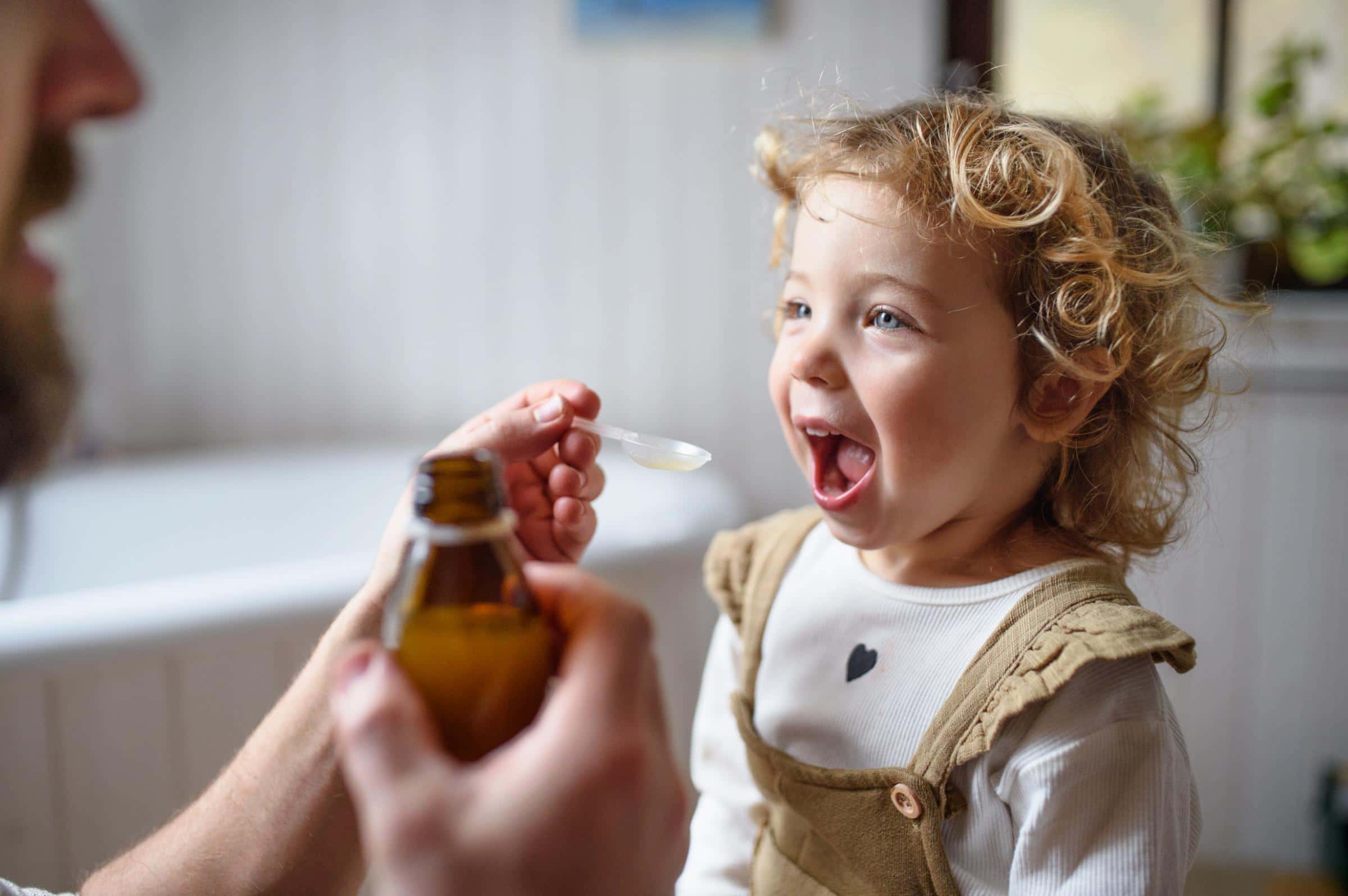 Kid taking probiotics for a better health